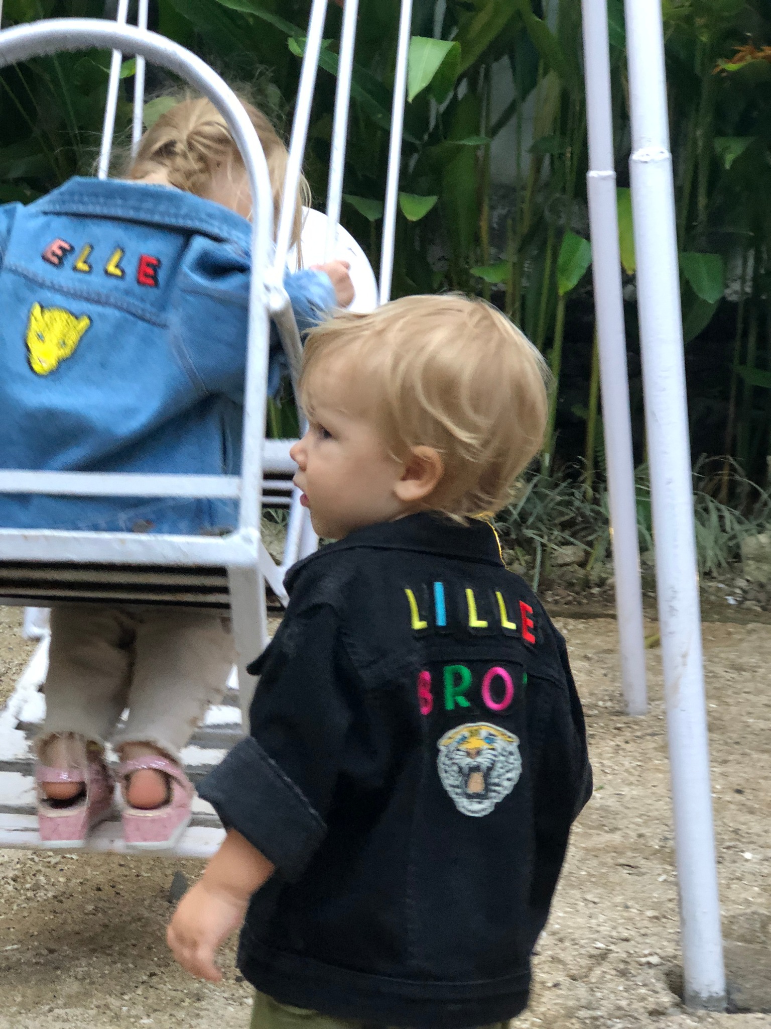 Matilda Gyllenhammar’s daughter and son wearing personalised denim at the swings