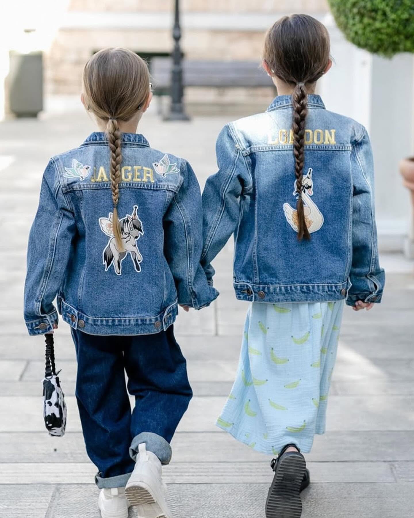 Two girls in Mrs Mighetto x Patchy Tiger denim jackets