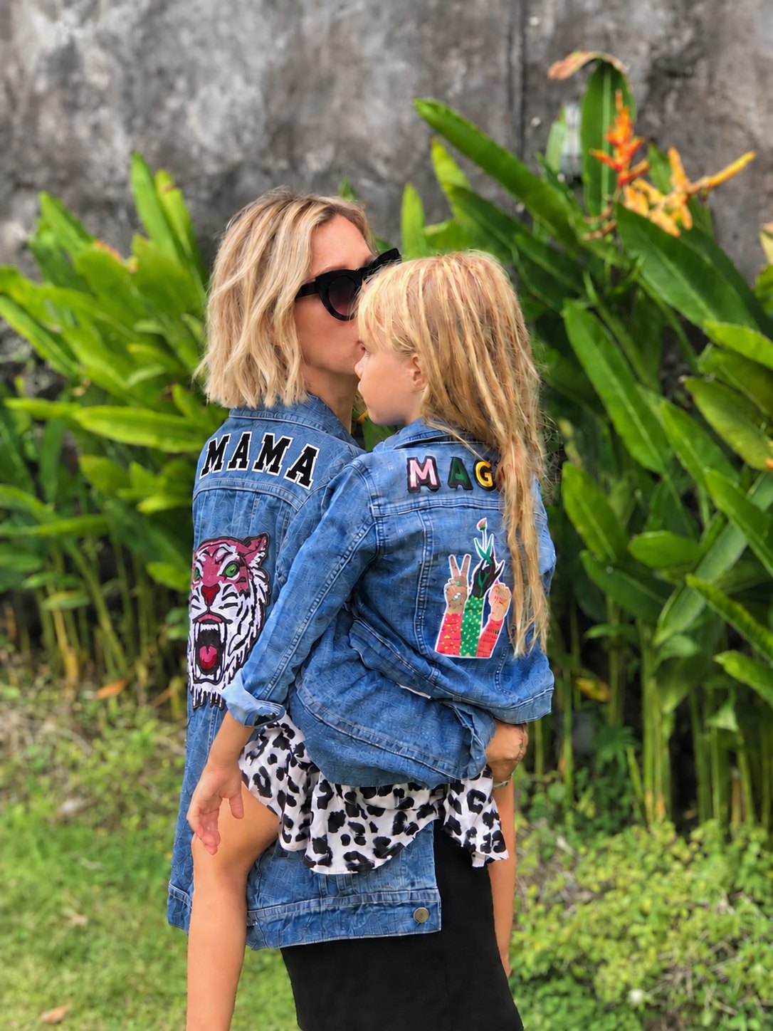 Matilda Gyllenhammar holding her daughter in matching Patchy Tiger denim