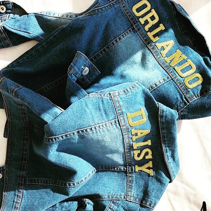 Orlando and Daisy names embroidered on personalised denim