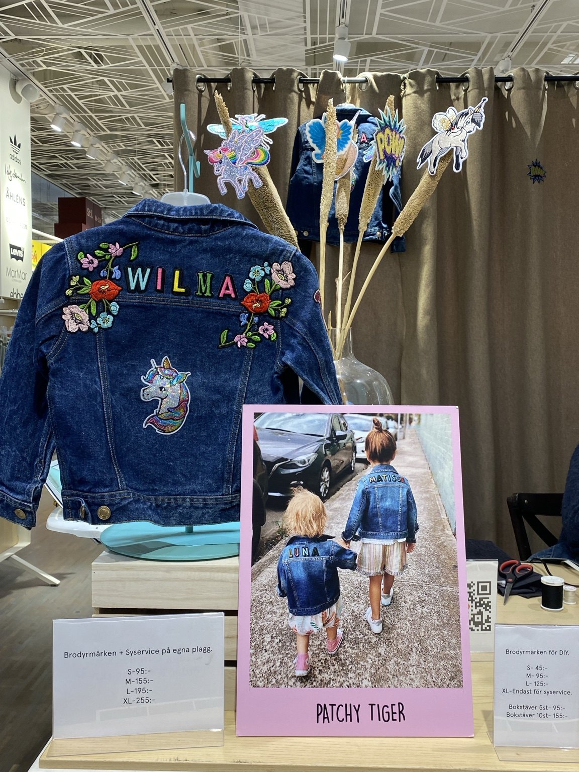 Personalised Wilma denim jacket and Patchy Tiger display at Åhléns