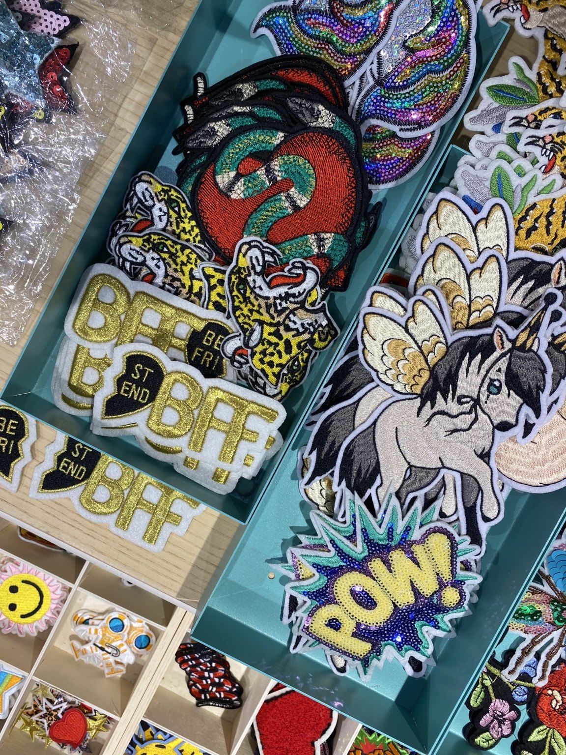 Selection of embroidered patches at the pop-up